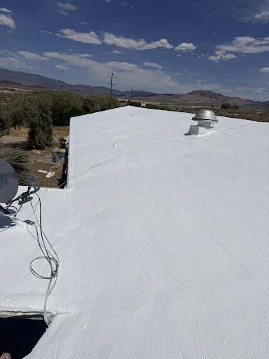 Spray foam roofing system installed on a commercial flat roof