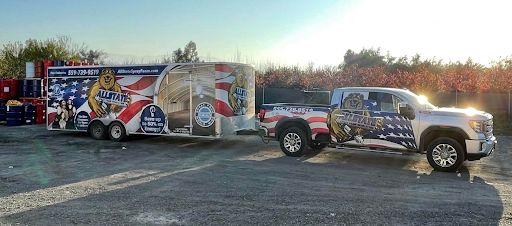 Allstate's modern wrapped truck and trailer rig with American flag graphics